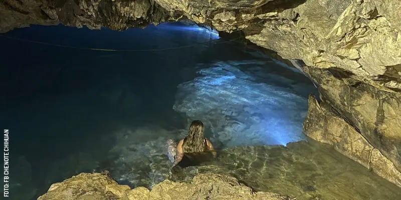 A woman swimming in Cenote Chichuan in Holcá, Yucatán.